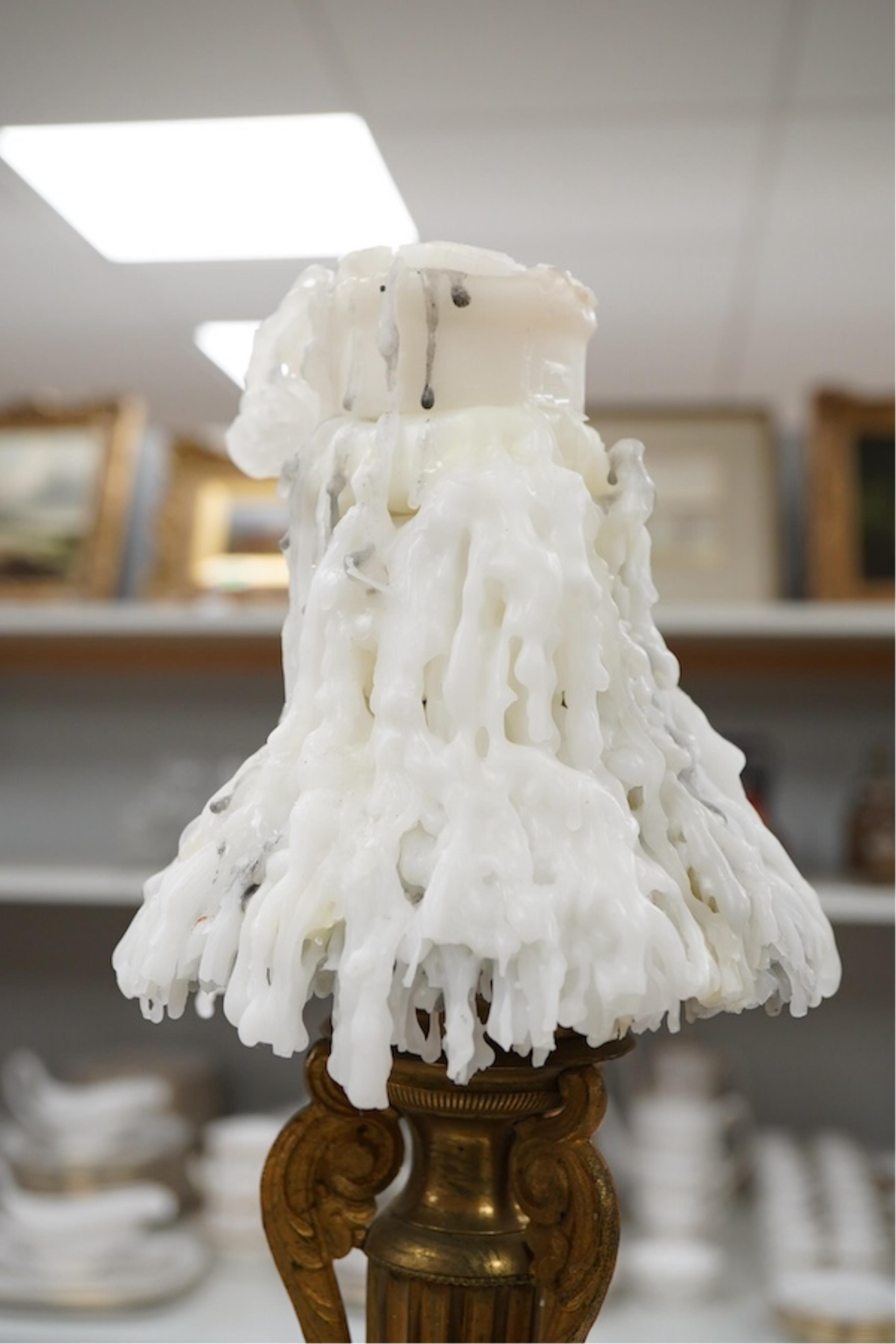 A brass column candlestick, 73cm